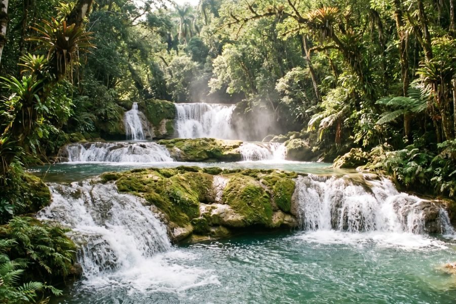 Cascading waterfall over limestone terraces near Ocho Rios, Jamaica